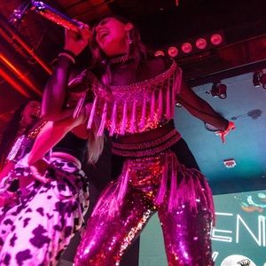 Beyoncé black and gold catsuit with gold sequins